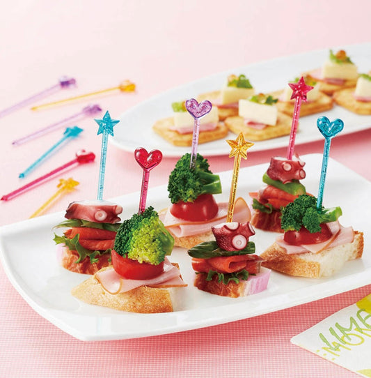 12 mini bețișoare cu sclipici (inimă și stea)